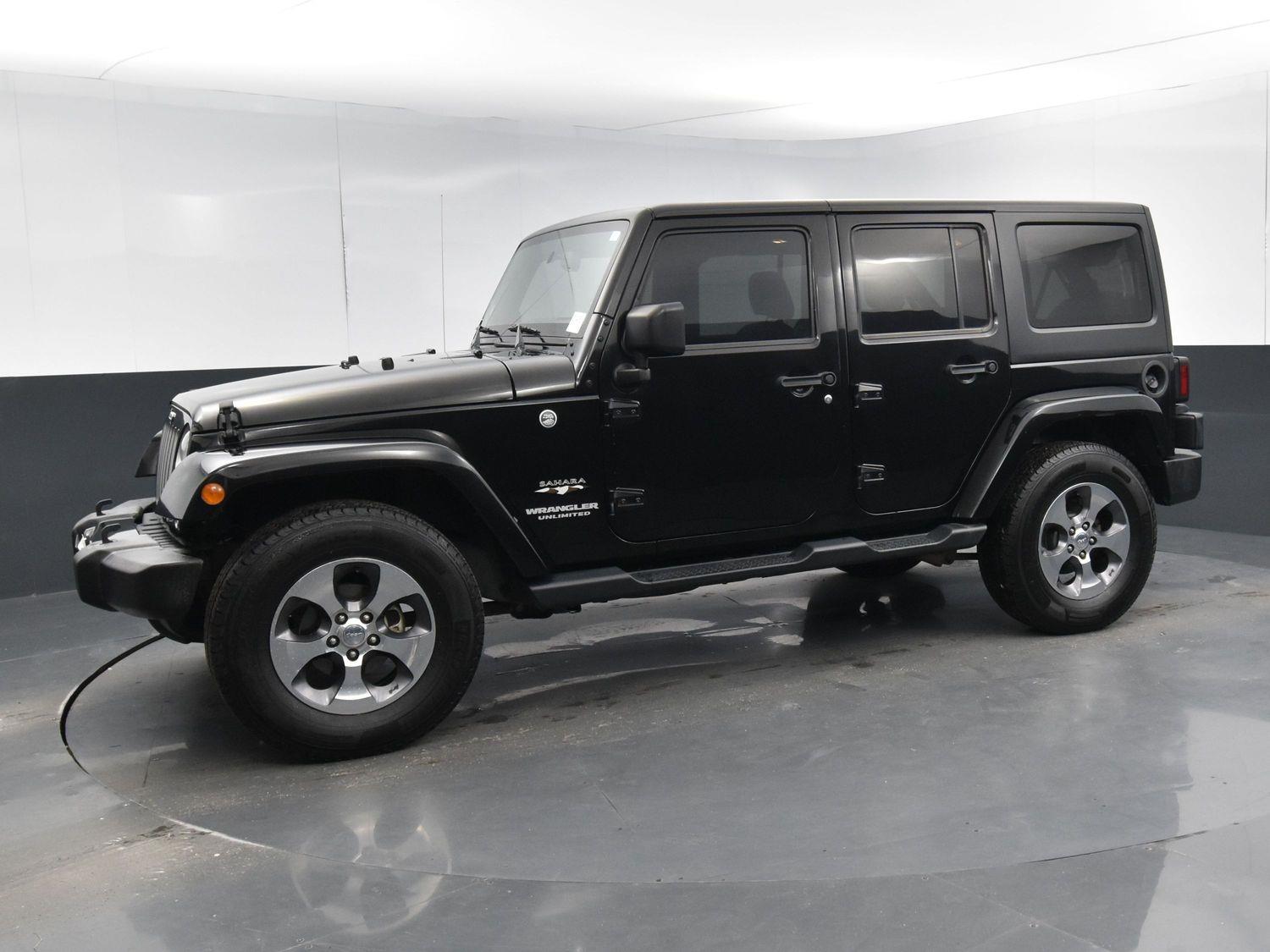 Used 2016 Jeep Wrangler Unlimited Sahara with VIN 1C4BJWEG5GL305436 for sale in Grand Island, NE