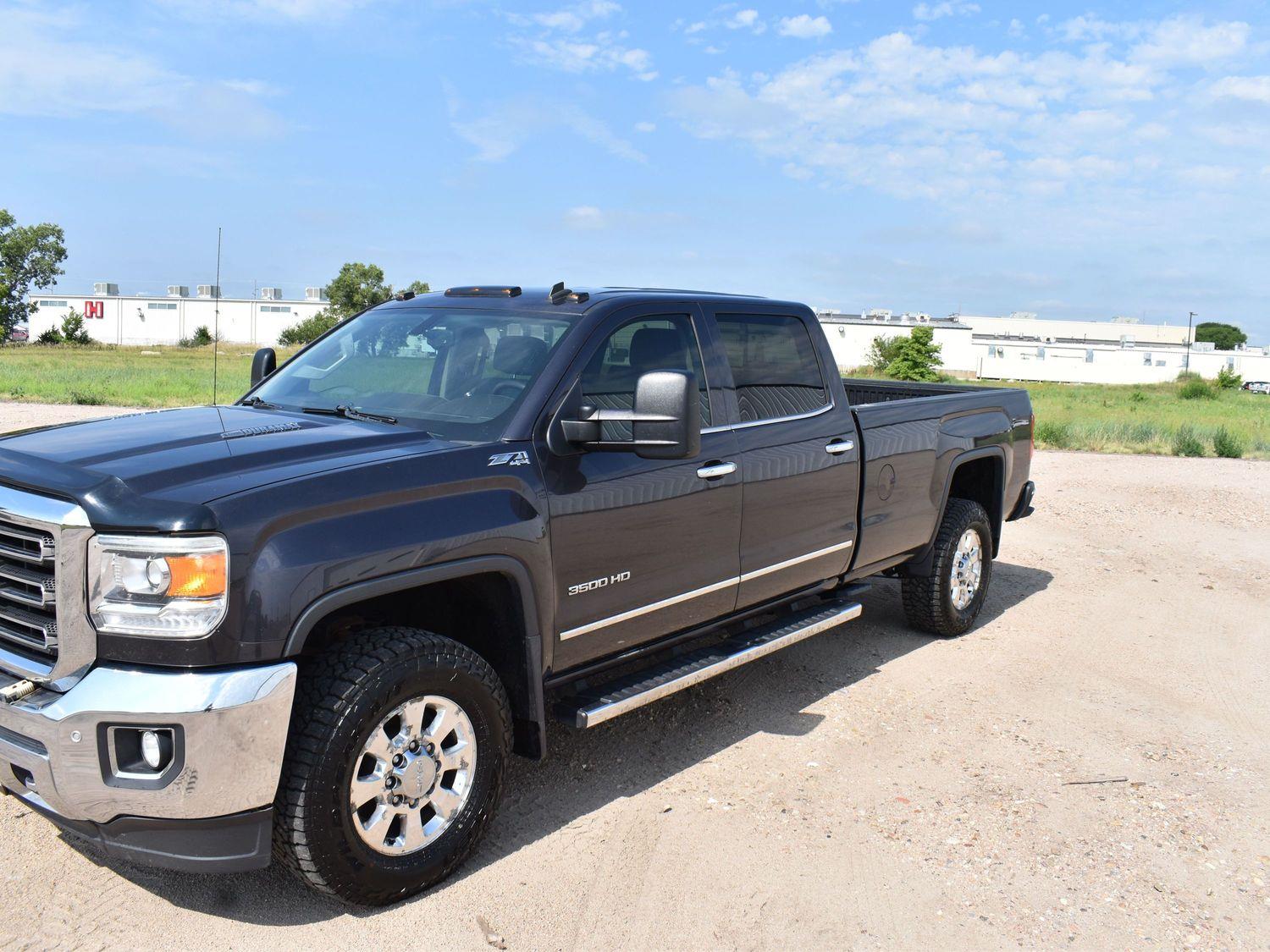 Used 2015 GMC Sierra 3500 SLT with VIN 1GT423C8XFF172542 for sale in Grand Island, NE