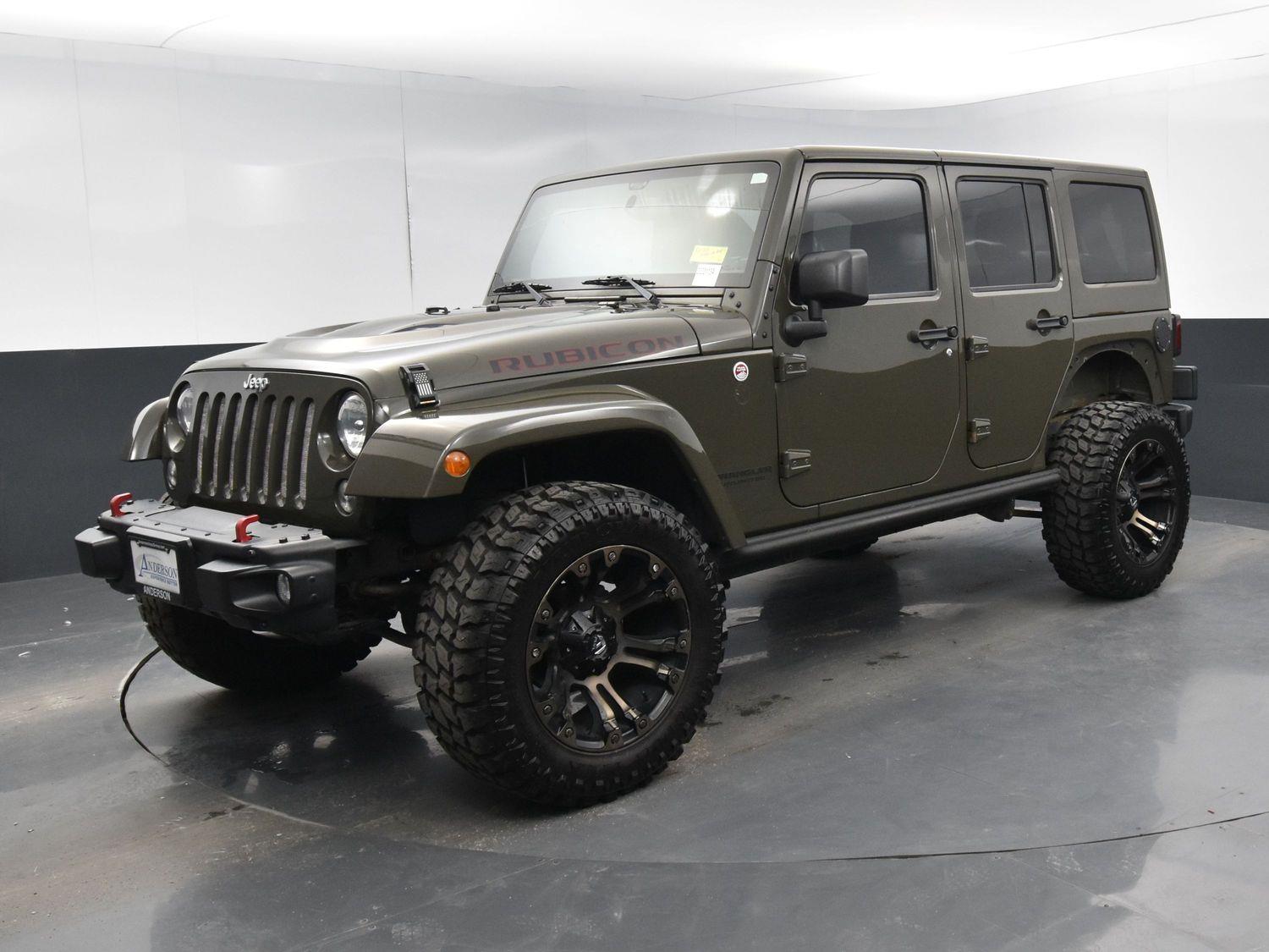 Used 2015 Jeep Wrangler Unlimited Rubicon Hard Rock with VIN 1C4BJWFGXFL669736 for sale in Grand Island, NE