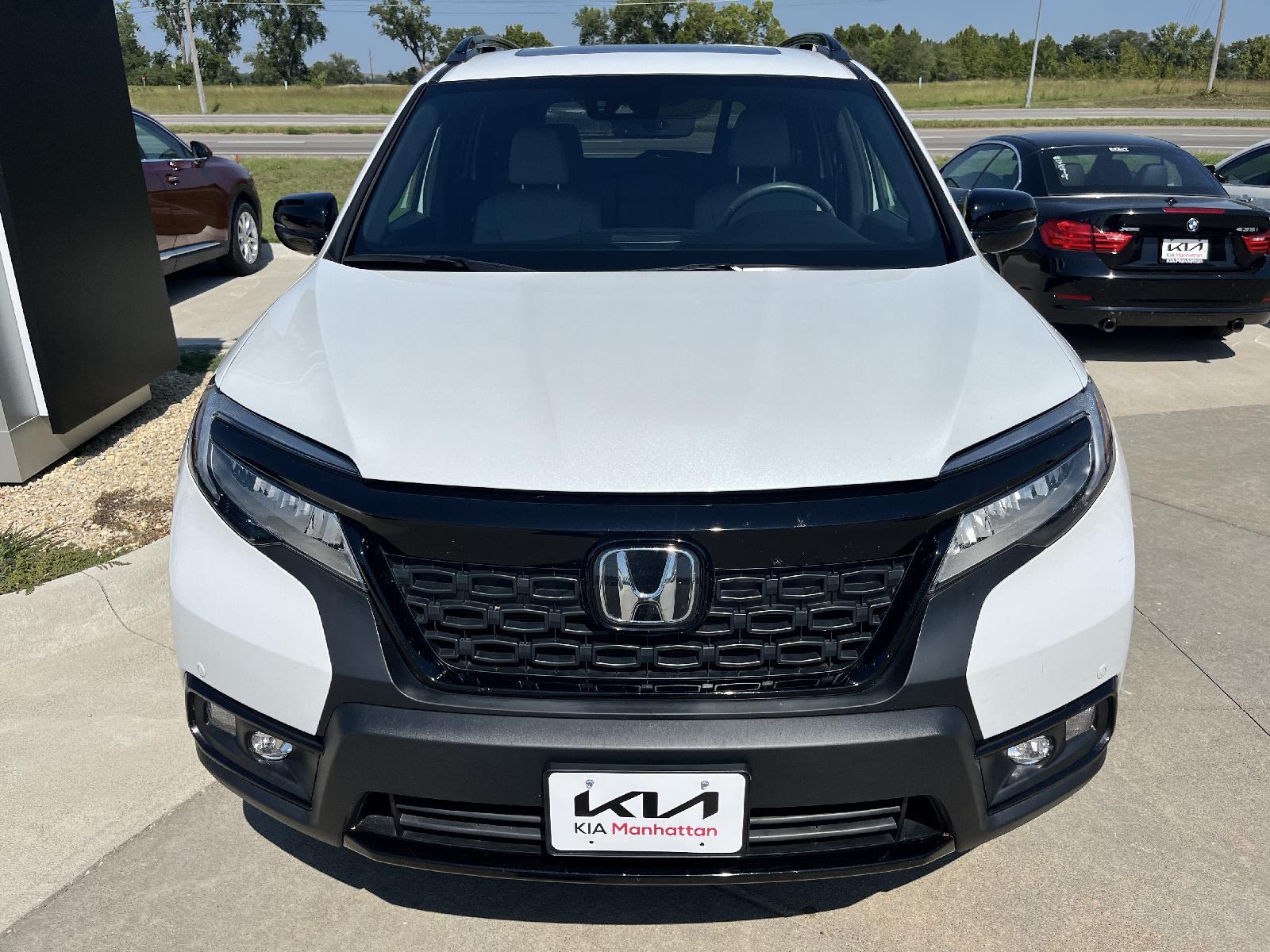 Used 2021 Honda Passport Elite with VIN 5FNYF8H07MB028521 for sale in Manhattan, KS