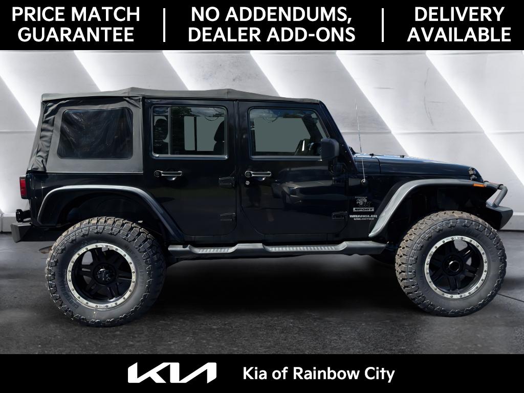 2012 Jeep Wrangler Unlimited Sport photo 2