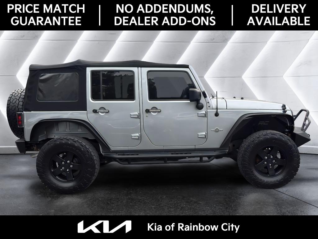 2015 Jeep Wrangler Unlimited Freedom Sport photo 2