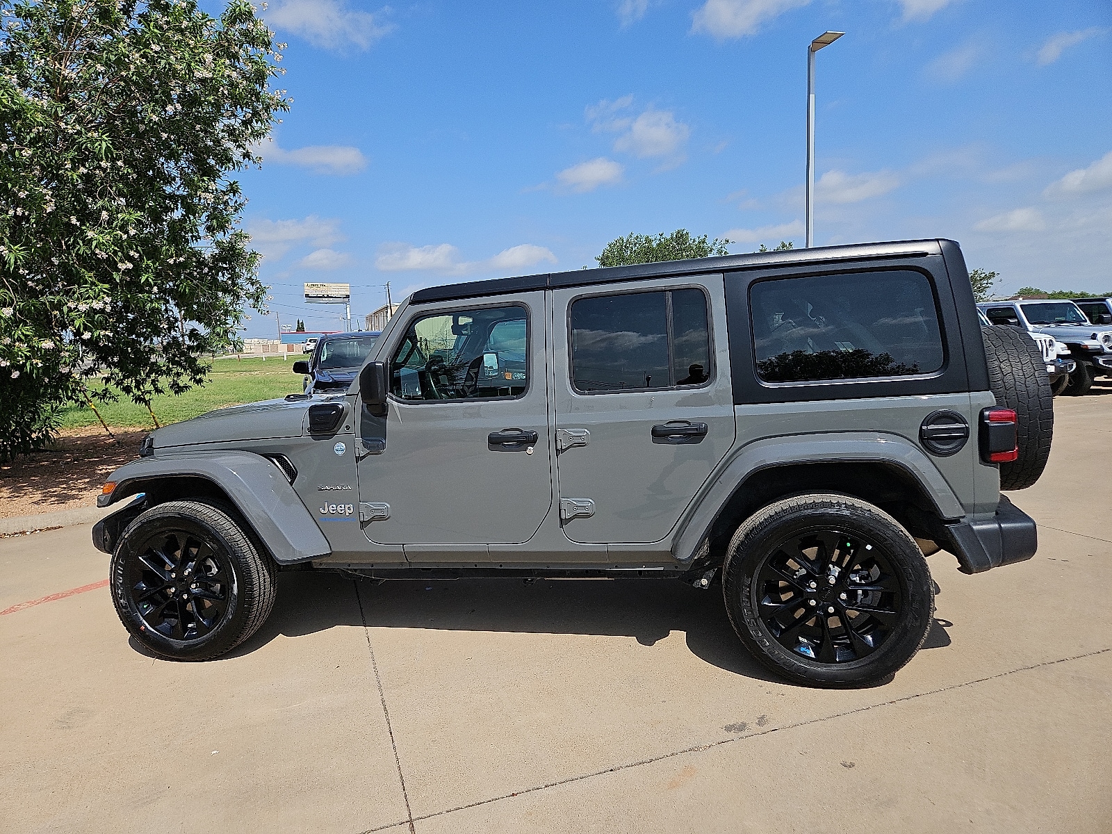 Used 2023 Jeep Wrangler 4xe Sahara 4XE with VIN 1C4JJXP69PW703673 for sale in San Angelo, TX