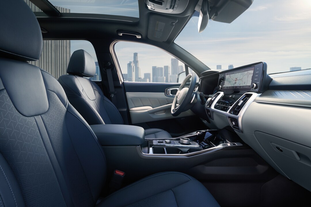 Person cheerfully signing documents.