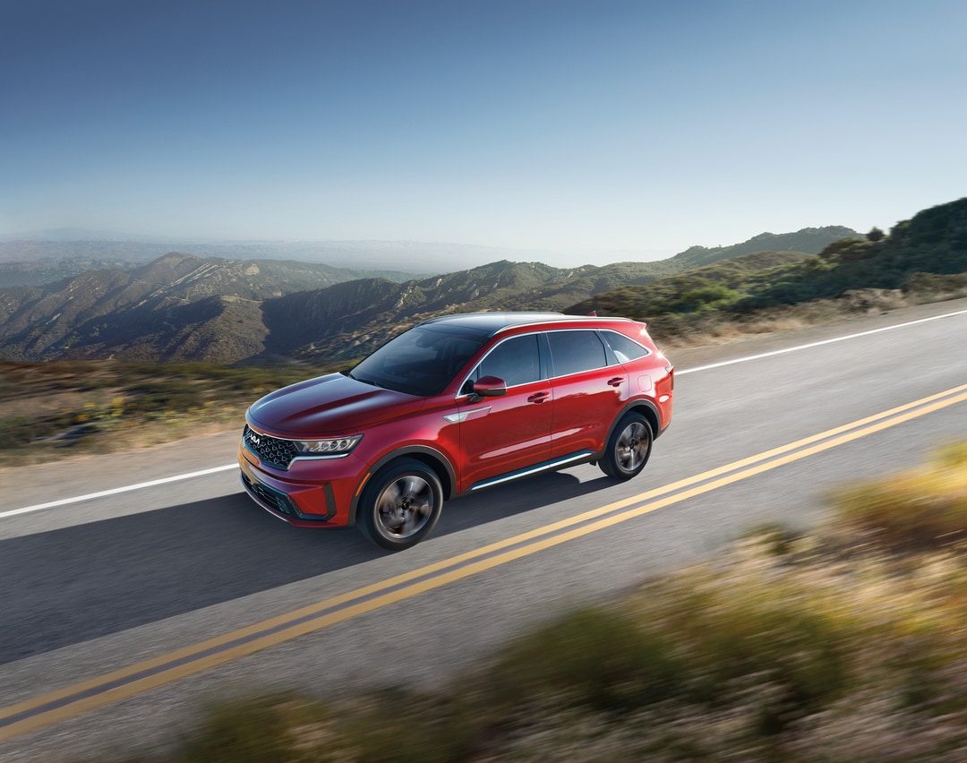 Person cheerfully signing documents.