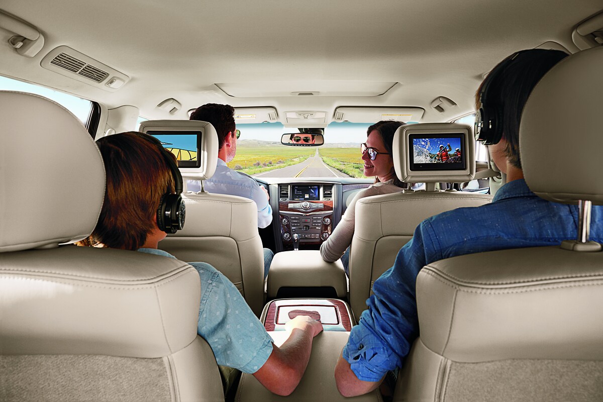 Family riding in Nissan SUV