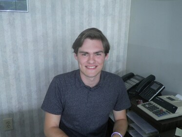 Staff member TJ Lovvom from 57ab21885ed0