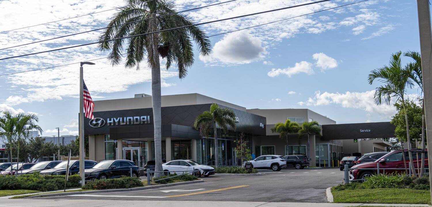 King Genesis dealership exterior in Deerfield Beach, FL