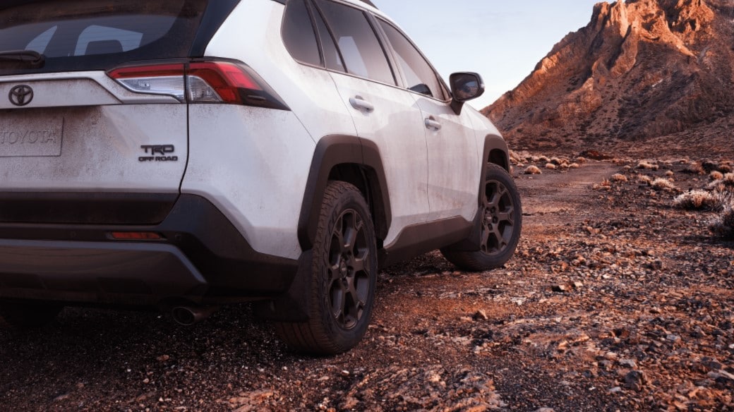 2021 toyota rav4 TRD off-road trim driving in rocky desert terrain