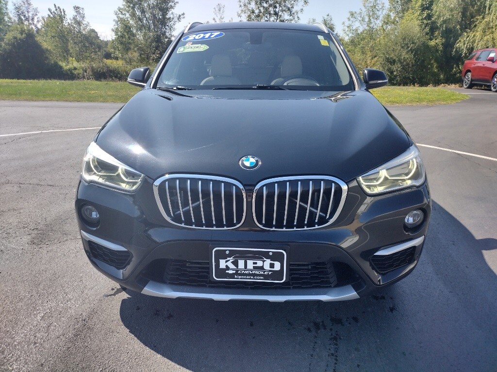 Used 2017 BMW X1 28i with VIN WBXHT3C36H5F74527 for sale in Ransomville, NY