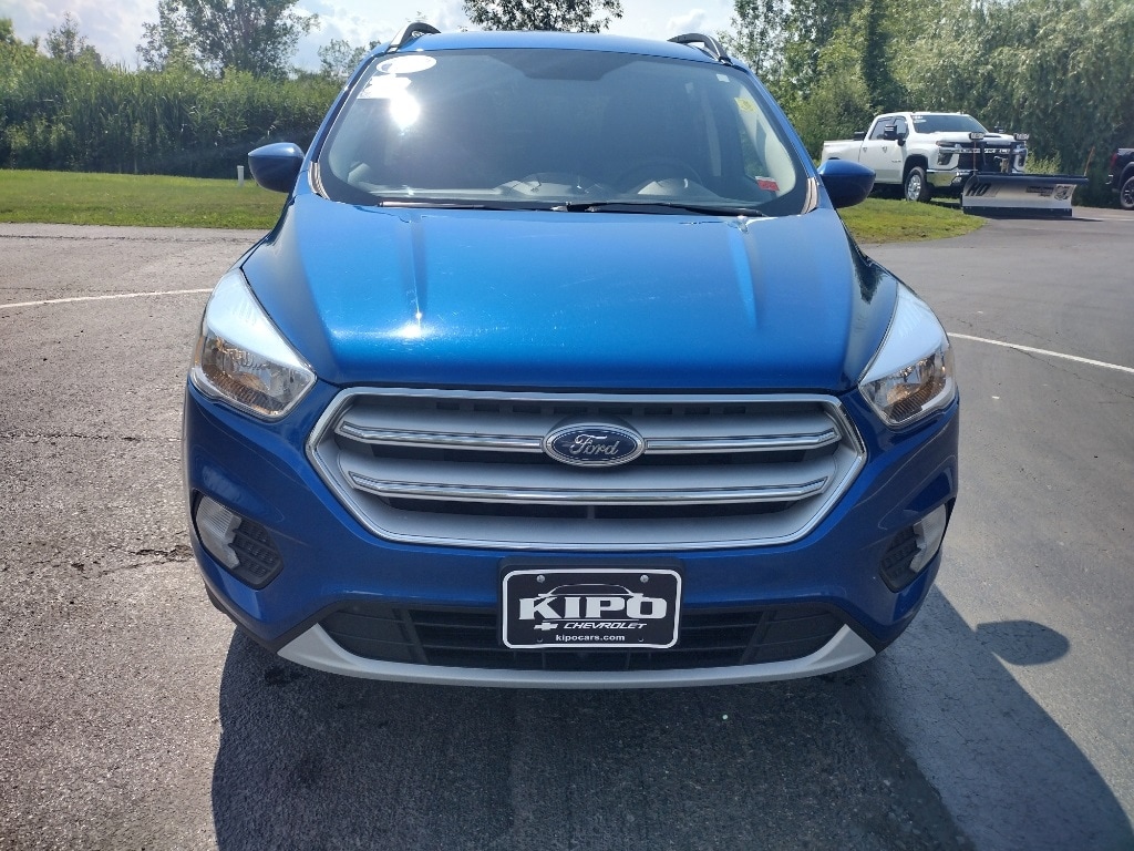 Used 2018 Ford Escape SE with VIN 1FMCU9GD9JUD31065 for sale in Ransomville, NY