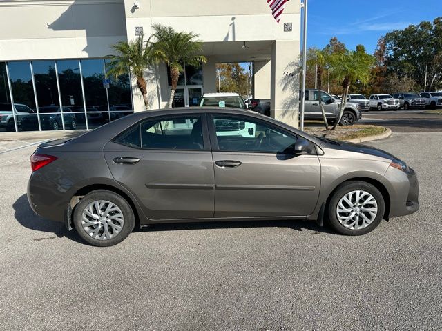 Used 2018 Toyota Corolla LE with VIN 2T1BURHE7JC111198 for sale in St. Cloud, FL