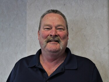 Staff member Troy Adcock from c435006fe16c