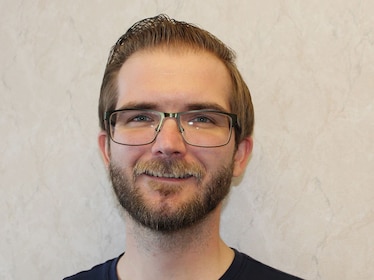 Staff member Nick Thompson from 9d19558010bc