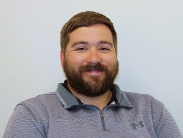 Staff member Alex Dodson from 08399b14ce55