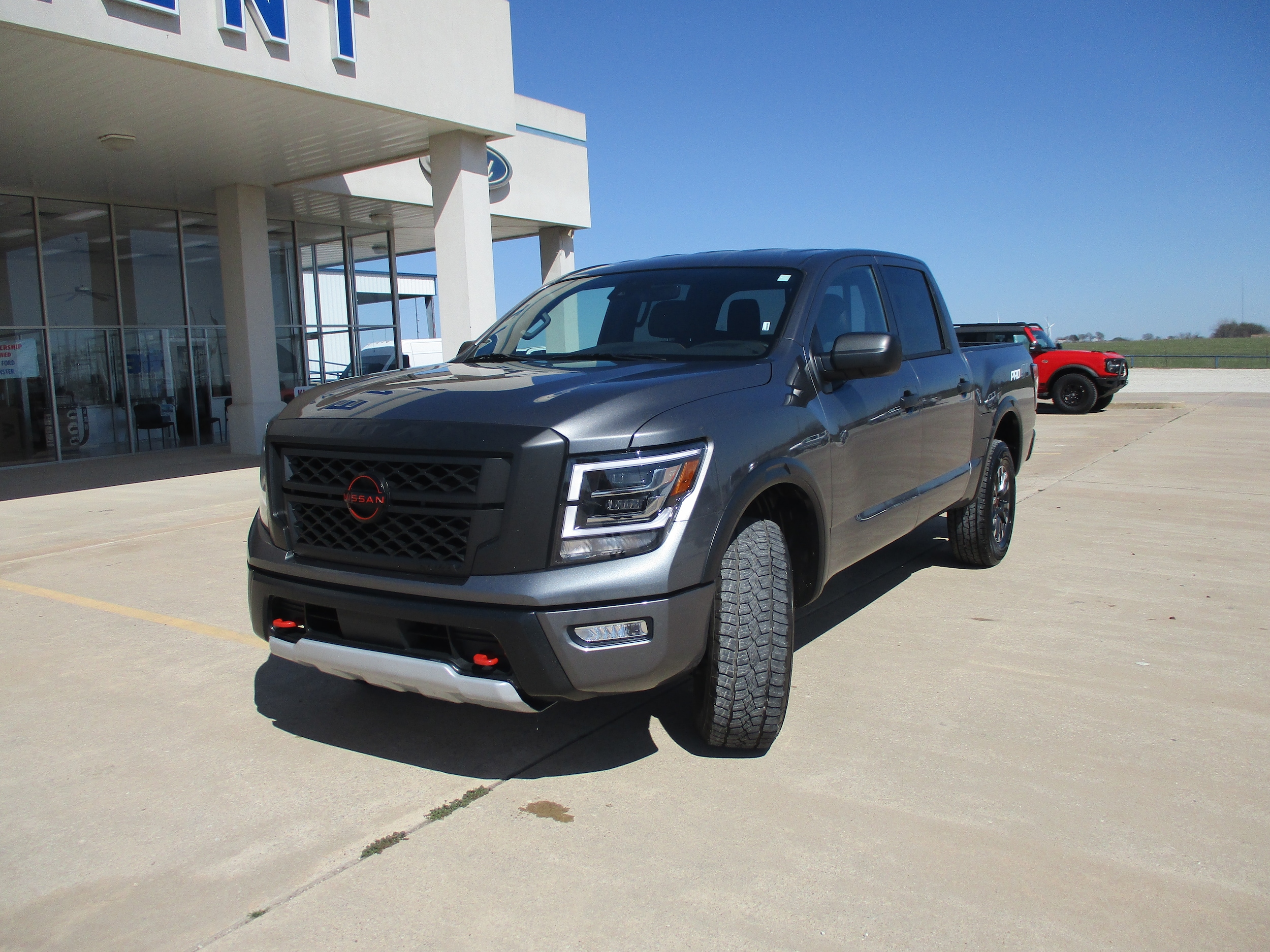 Used 2023 Nissan Titan PRO-4X with VIN 1N6AA1ED1PN104669 for sale in Muenster, TX