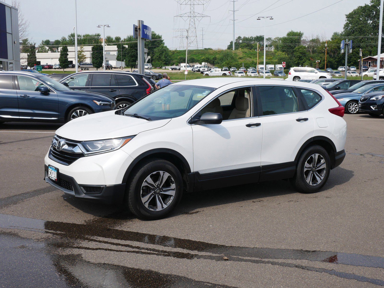 Used 2019 Honda CR-V LX with VIN 2HKRW6H38KH217115 for sale in Maplewood, Minnesota