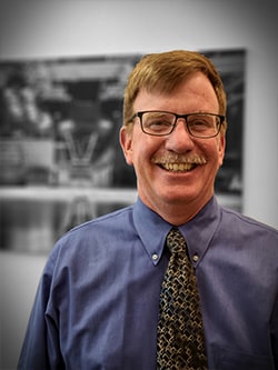 Staff member Ted Cahill from ID_8dd0b460b93d