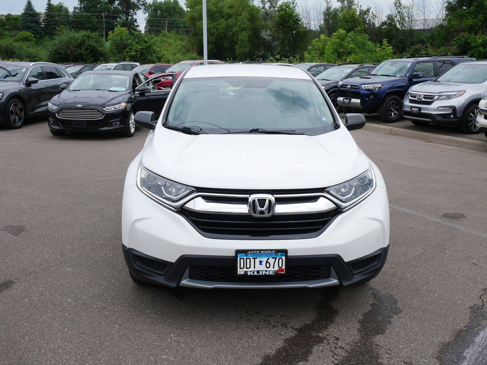 Used 2019 Honda CR-V LX with VIN 2HKRW6H38KH217115 for sale in Maplewood, Minnesota