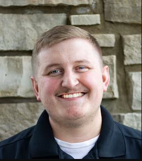 Staff member Kevin Ollanketo from ID_9377d7