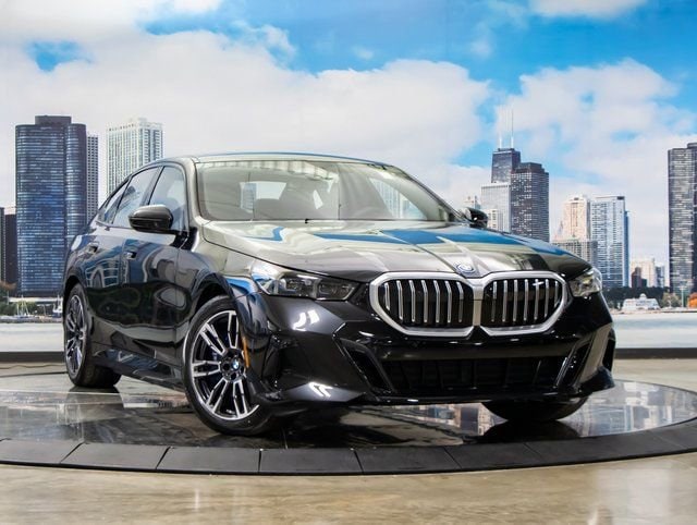 2026 BMW 5 Series 550e xDrive Sedan's photo