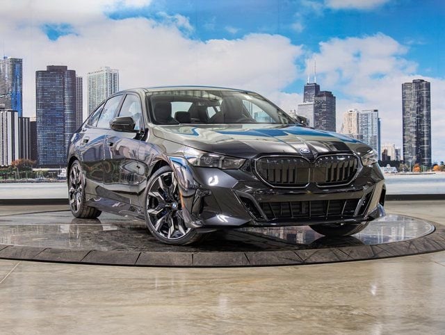 2026 BMW 5 Series 550e xDrive Sedan's photo