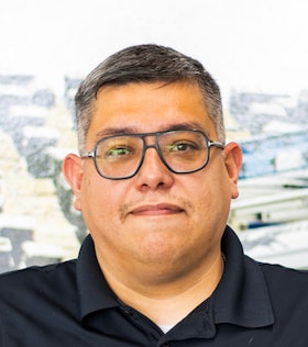 Staff member Oscar Lozada from ID_5a8af8e3e001