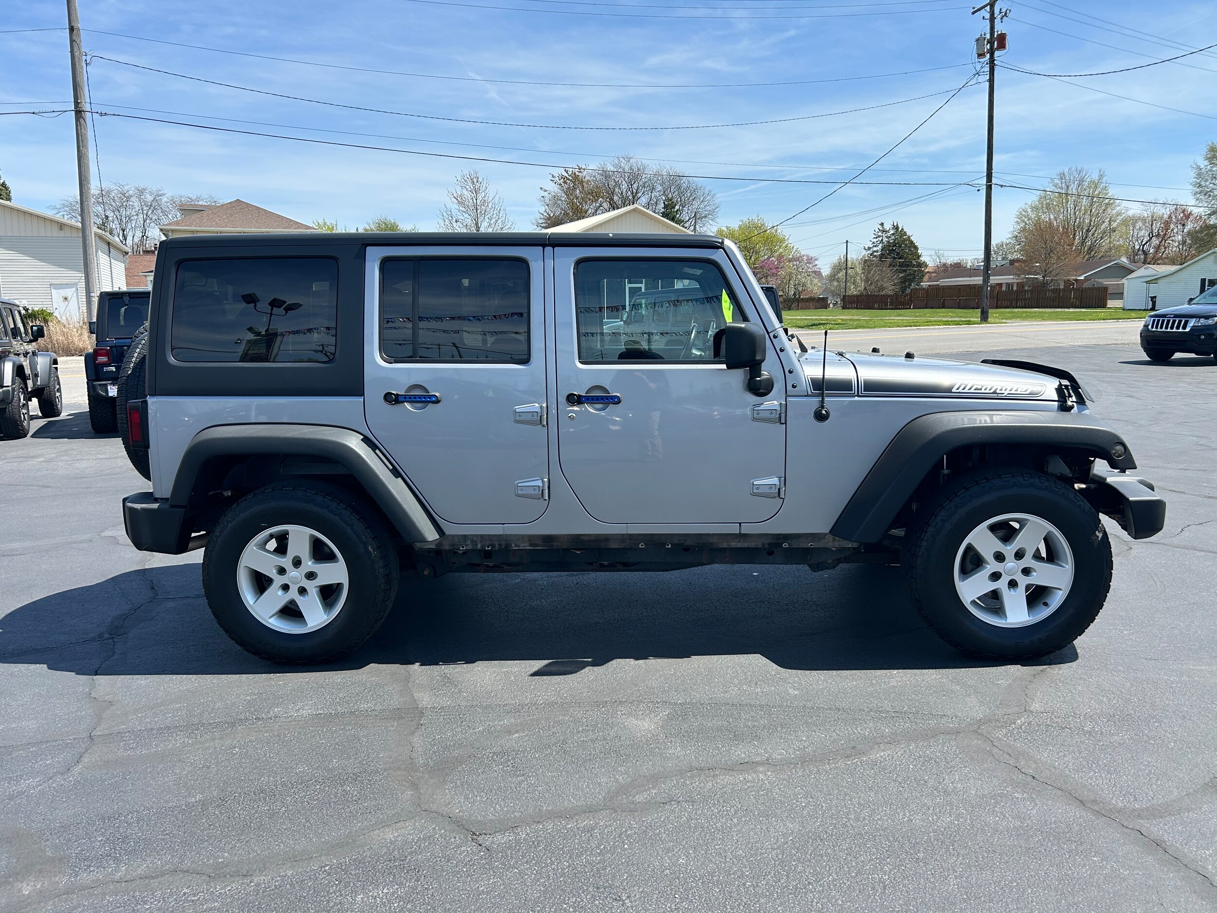 Used 2017 Jeep Wrangler Unlimited Sport S with VIN 1C4BJWDG0HL623029 for sale in Delphos, OH
