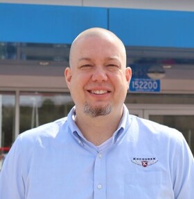Staff member BRANDON from 5e7ab92a8536