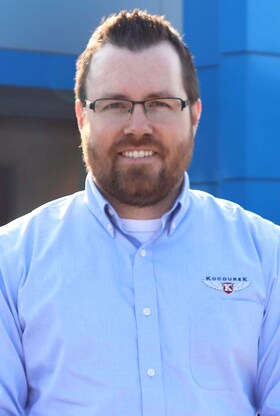 Staff member TOM from 5e7ab92a8536