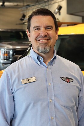 Staff member John from ID_69987b