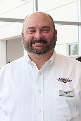 Staff member Greg from 5730136685b8