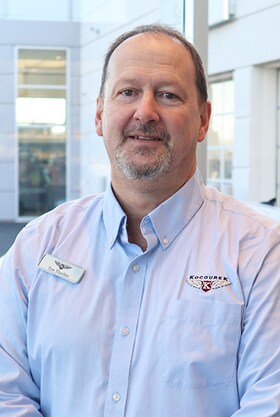 Staff member Tim from ID_746072