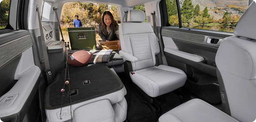 Three rows with captain's chairs