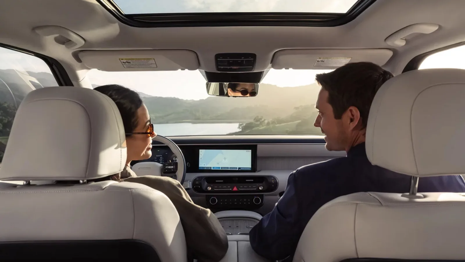 A couple staying cool and comfortable inside their Hyundai