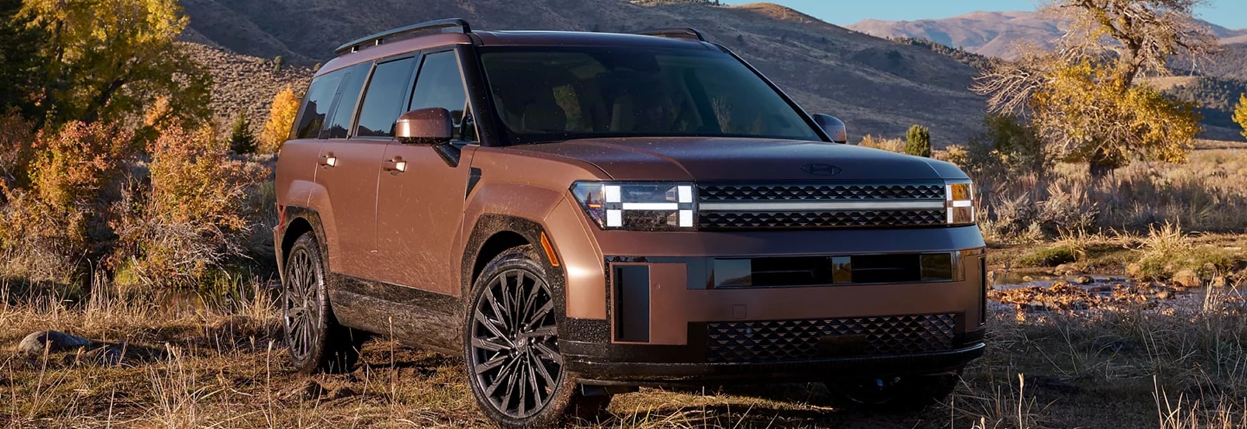 2026 Hyundai Santa Fe Hybrid driving on scenic road