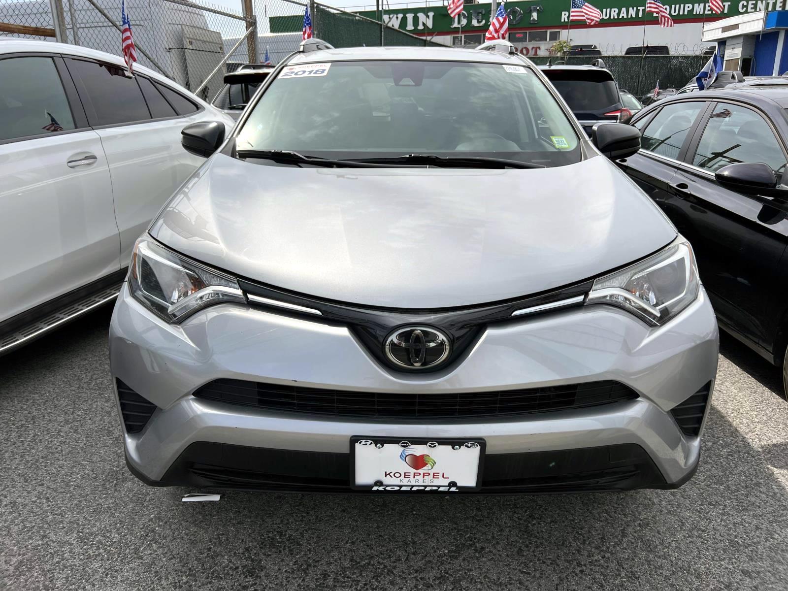 Used 2018 Toyota RAV4 LE with VIN 2T3ZFREV3JW485021 for sale in Long Island City, NY