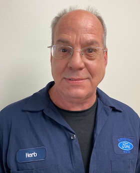 Staff member Dave Herbert from 8586a6ab09ce