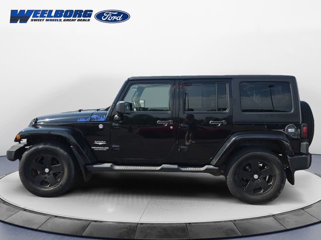 Used 2011 Jeep Wrangler Unlimited Sahara with VIN 1J4BA5H17BL532969 for sale in Redwood Falls, Minnesota