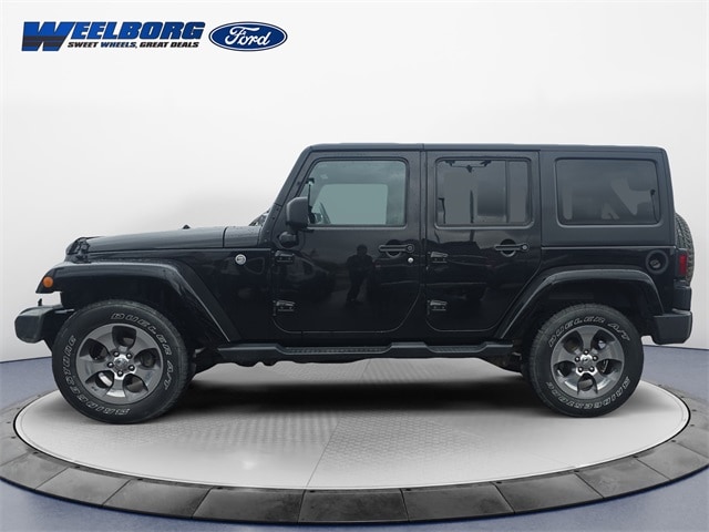Used 2016 Jeep Wrangler Unlimited Sahara with VIN 1C4BJWEG5GL327047 for sale in Redwood Falls, Minnesota