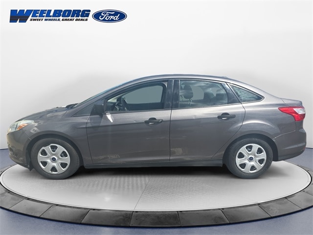 Used 2014 Ford Focus S with VIN 1FADP3E24EL450013 for sale in Minneapolis, Minnesota