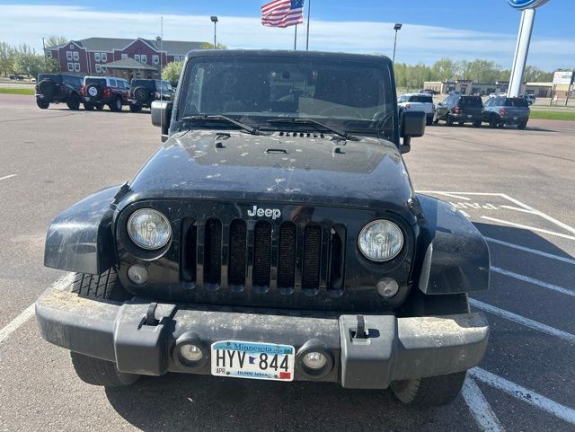 Used 2011 Jeep Wrangler Unlimited Sahara with VIN 1J4BA5H17BL532969 for sale in Redwood Falls, Minnesota