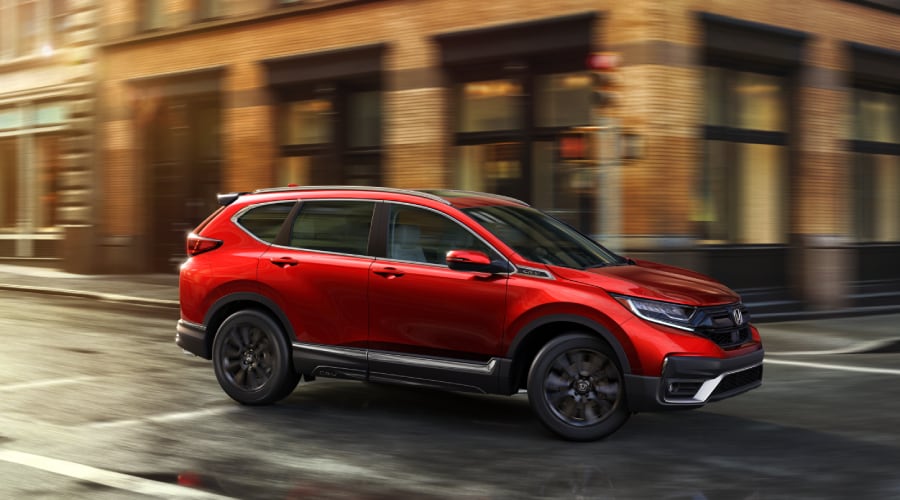 New Honda CR-V driving through the city