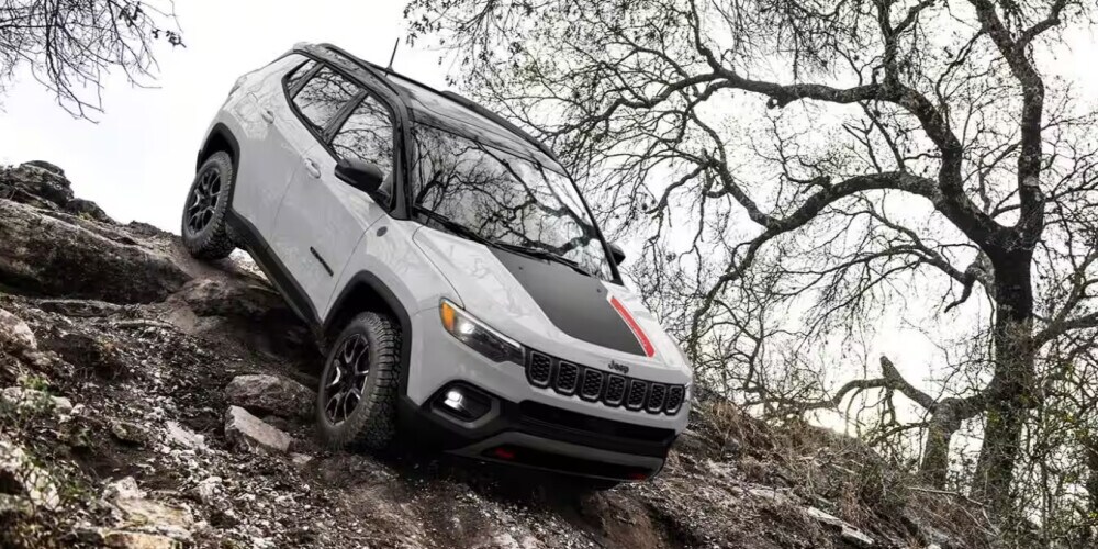 2024 Jeep Compass driving on an incline
