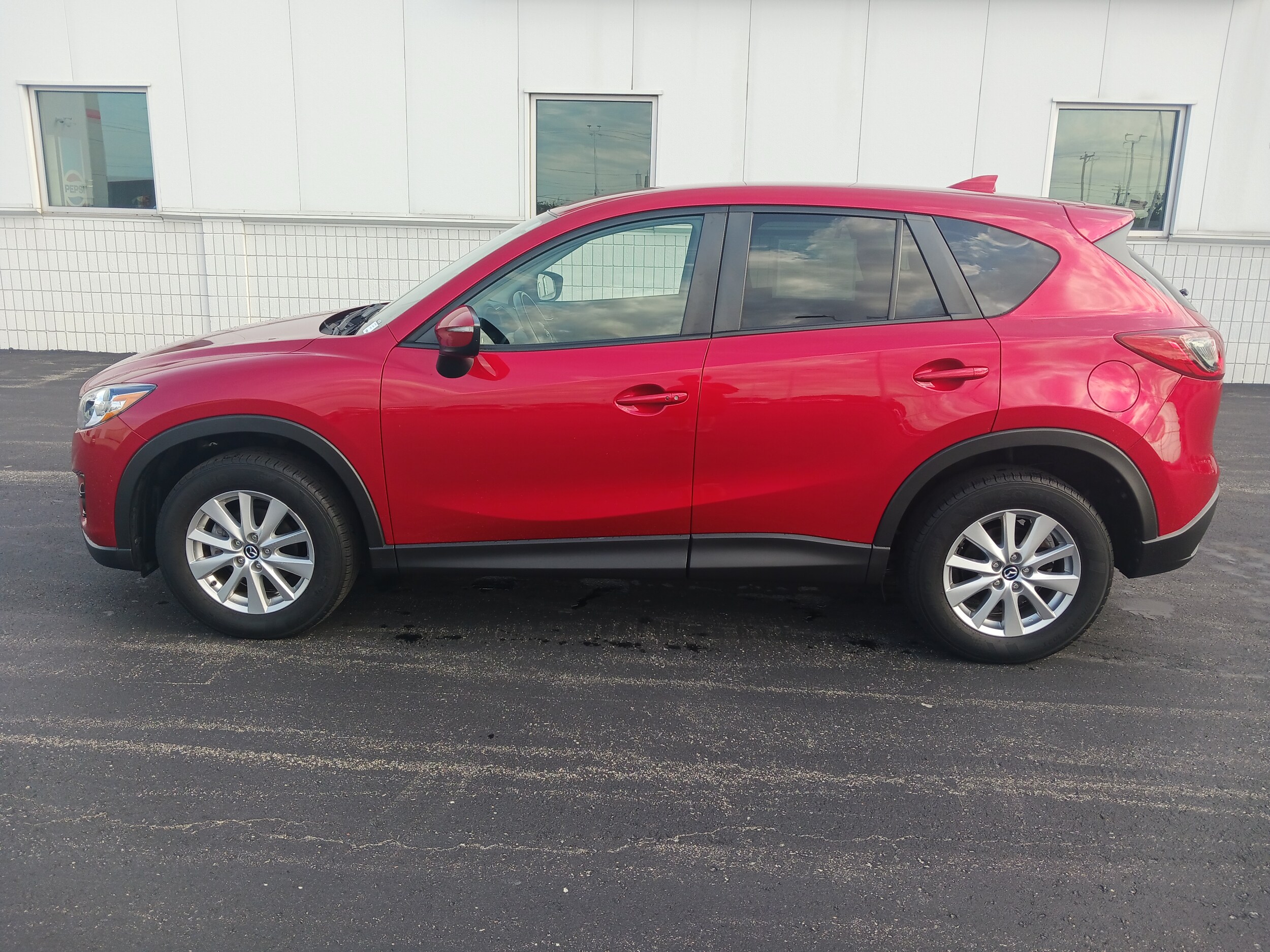 Used 2016 Mazda CX-5 Touring with VIN JM3KE4CY1G0917923 for sale in Appleton, WI