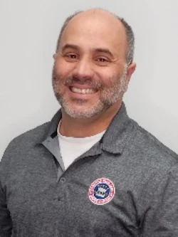 Staff member Rick Deleon from ID_83d469