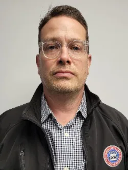Staff member Patrick Blackburn from ID_83d469