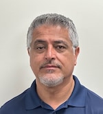 Staff member Khalid Nezami from ID_392fe9