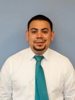 Staff member Robert Escobar from ID_272997