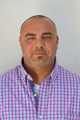 Staff member Mac Irizarry from c7db02bf60e0